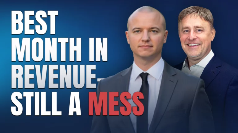 Two businessmen in suits against a blue gradient background with large white text reading 'Best month in revenue... still a mess'.] ,